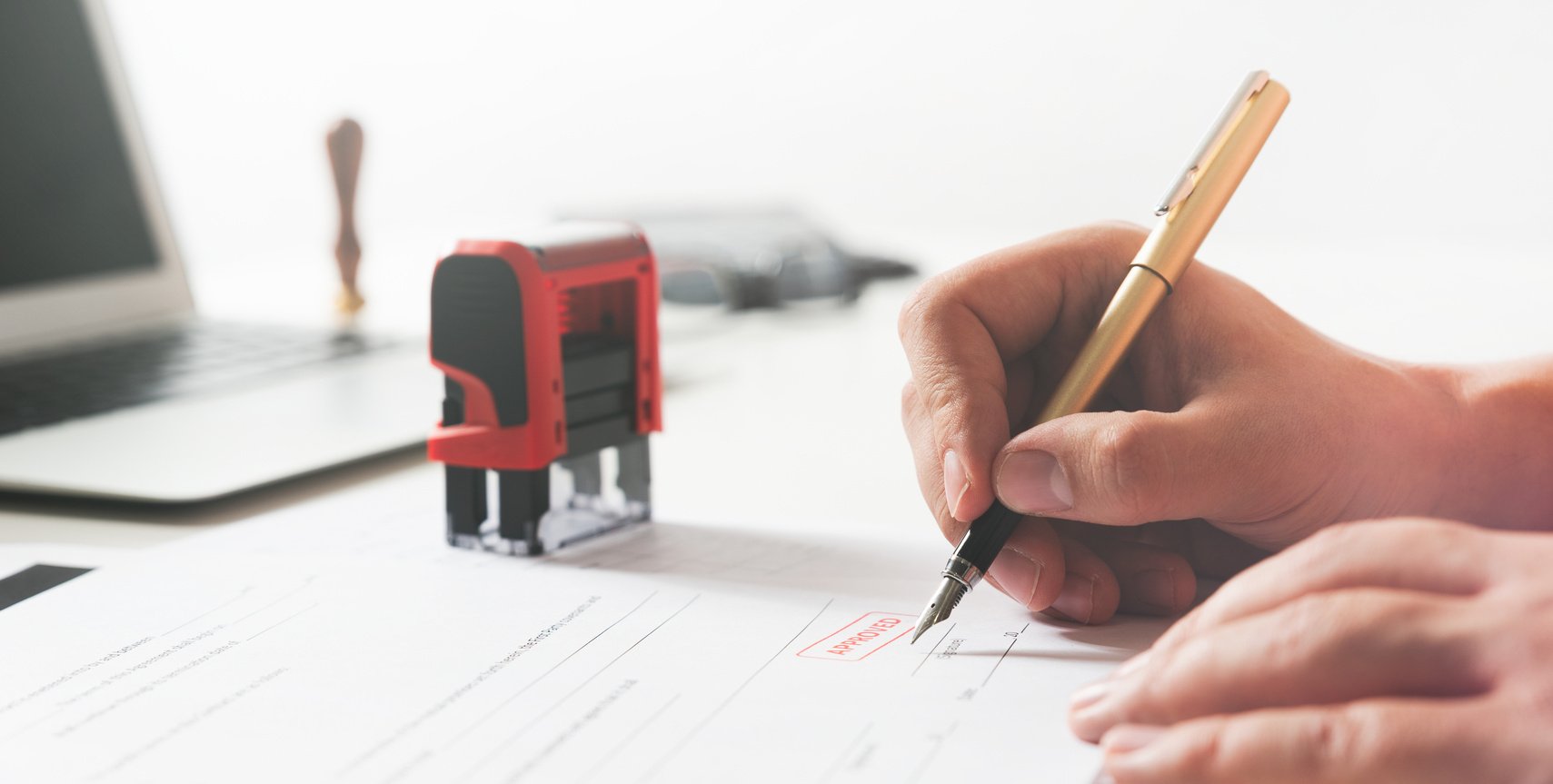 Lawyer working in office. Notary signs document